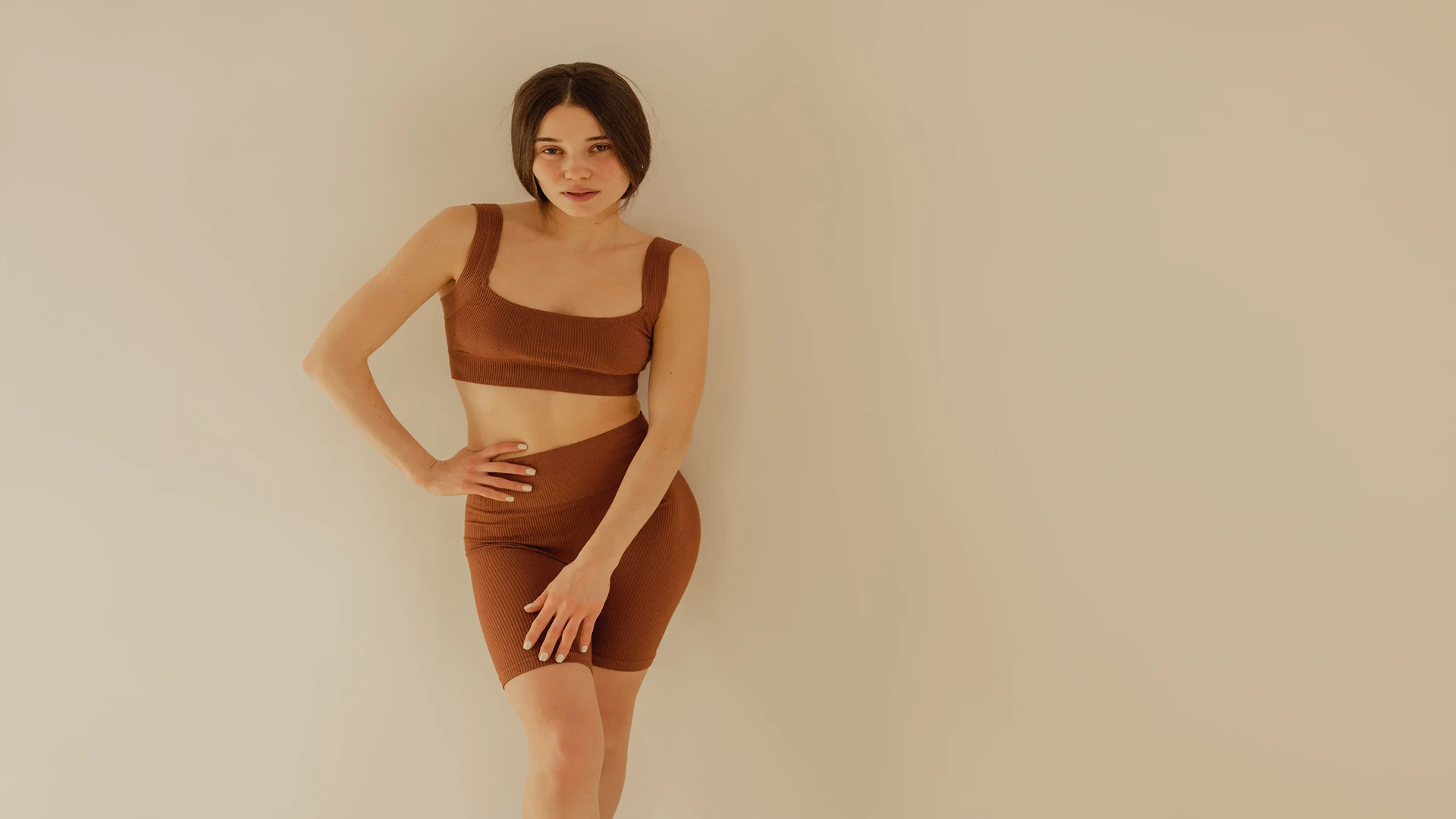 Close of up womens abdominal area wearing nude colored undergarments